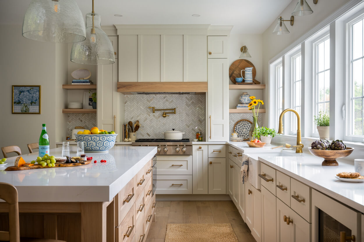range top alcove, open shelving, decorative hood, tile backsplash, hickory island, quartz counters