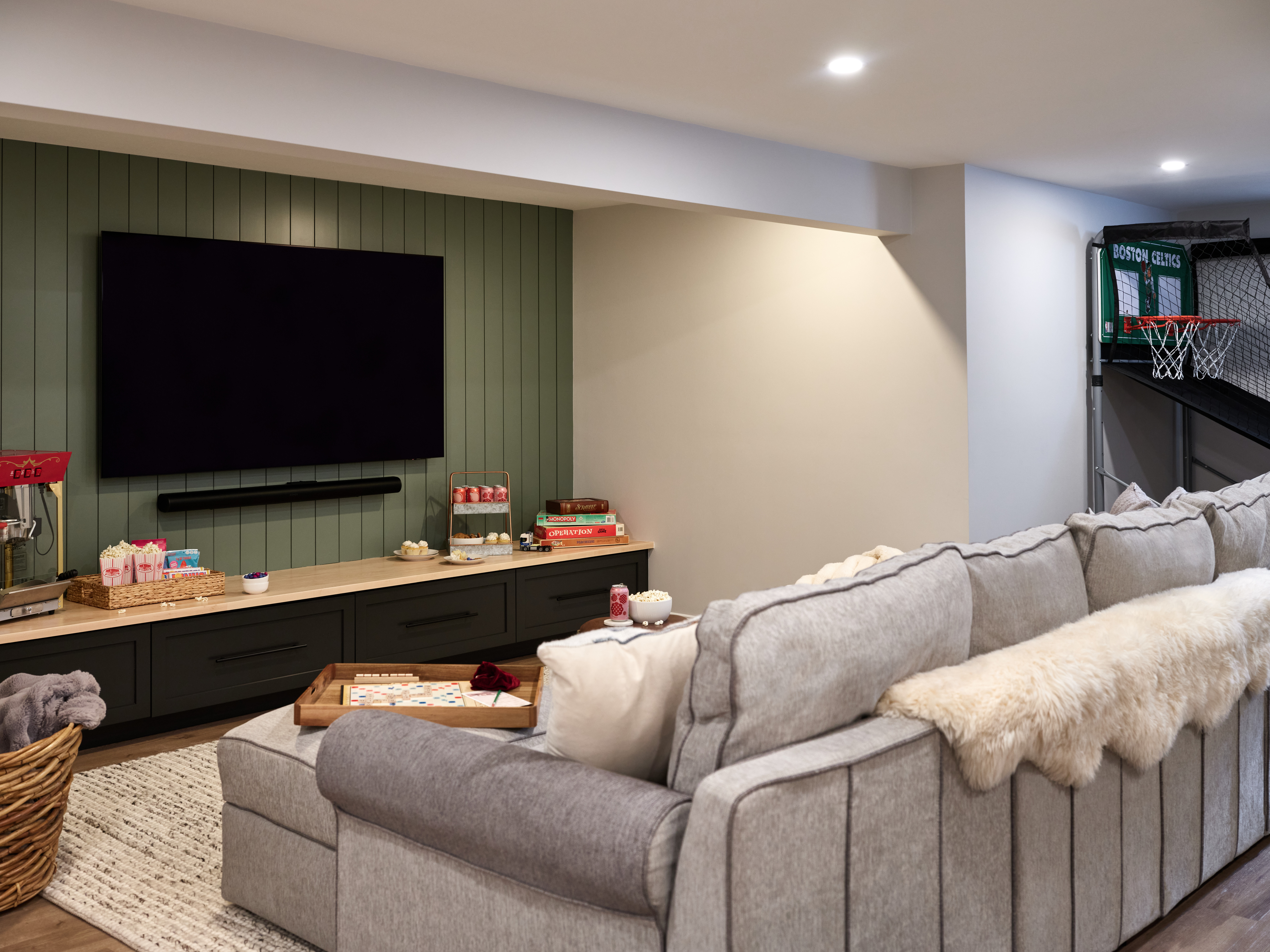 Finished basement remodel in Beverly MA with home gym and wellness area