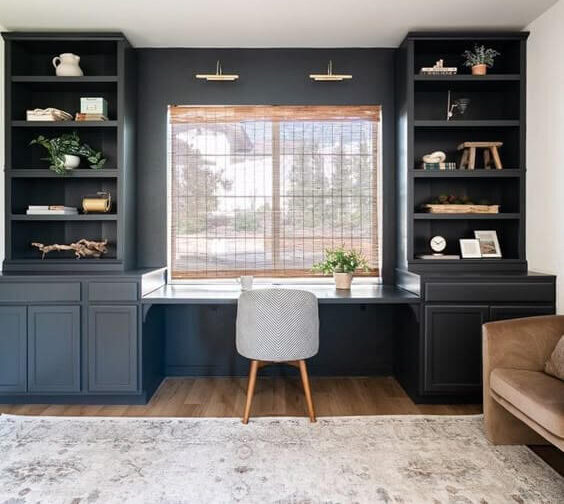 home office, blue built-ins, cream rug, window with shade